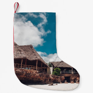 Old wooden tropical bungalow on the beachancient,a small christmas stocking