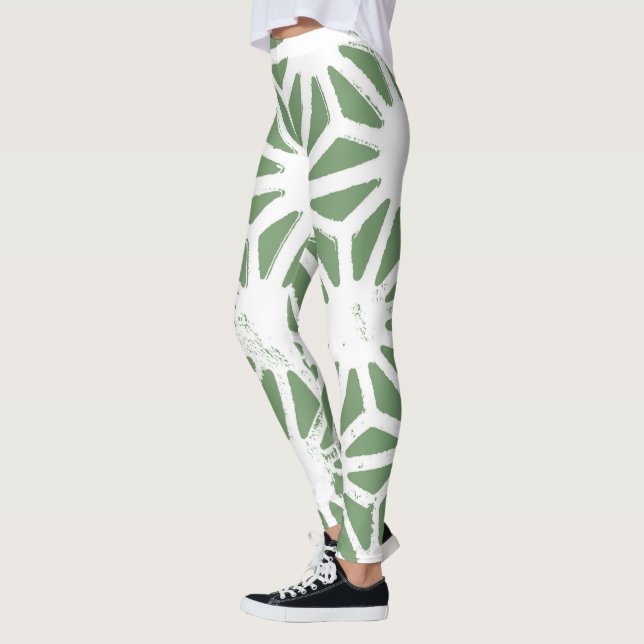 Olive green and white geometric pattern leggings (Left)