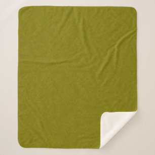 Olive green surface with subtle swirling pattern sherpa blanket