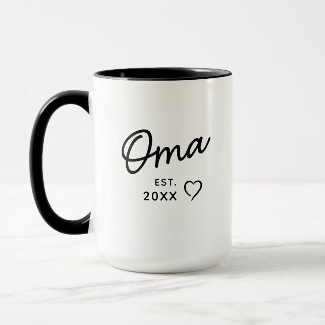 Oma Est Year  First Grandchild Pregnancy Reveal Mug (Left)