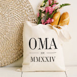 Oma Roman Numeral Year Established Tote Bag<br><div class="desc">A modern minimalist tote bag to celebrate a chic grandma,  this clean minimal tote features "Oma" or your choice of grandma nickname in black serif lettering. Customise with the year she became a grandmother beneath in elegant roman numerals for a chic touch.</div>