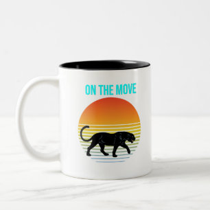 On the Move – Panther Walking Under a Retro Sunset Two-Tone Coffee Mug