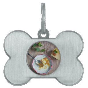 Onion pineapple chutney on rustic wood pet name tag