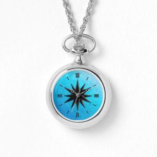 Onyx compass rose - turquoise glass background watch