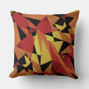 Opaque red and yellow triangles, spotty geometric cushion