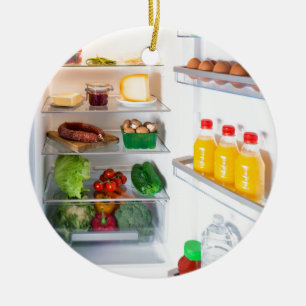 Open fridge filled with food ceramic ornament