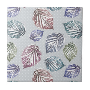 Openwork leaves on a light grey background ceramic tile