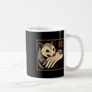 Opossum Biting Hand Coffee Mug