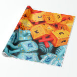 Orange and Blue Dreidels Wrapping Paper<br><div class="desc">Photo of colourful orange and blue dreidels. Image by Adiel lo,  wikicommons.</div>