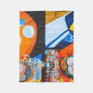 Orange and blue graffiti fleece blanket