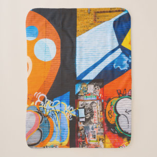Orange and blue graffiti sherpa blanket