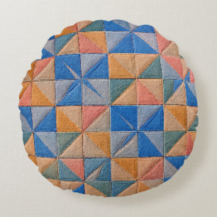 orange and blue quilt round cushion