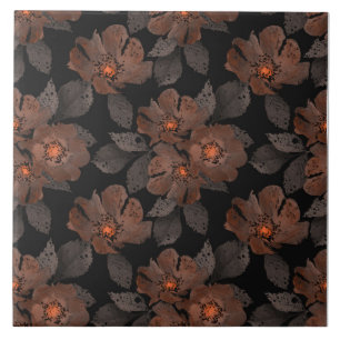 Orange and brown flowers on a black background. ceramic tile