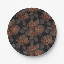 Orange and brown flowers on a black background.