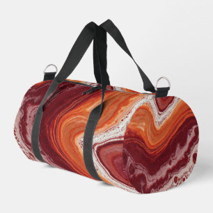orange and burgundi fluid duffle bag