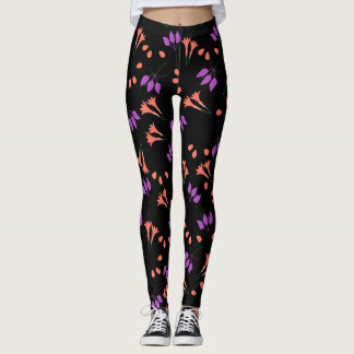 Orange and purple floral pattern on black leggings