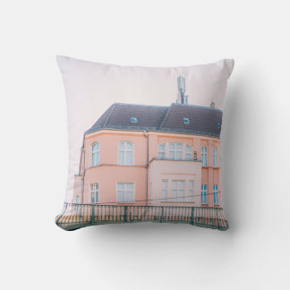 ORANGE AND WHITE CONCRETE BUILDING CUSHION