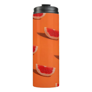 ORANGE AND WHITE FLORAL TEXTILE THERMAL TUMBLER