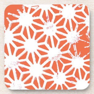 Orange and white geometric pattern coaster