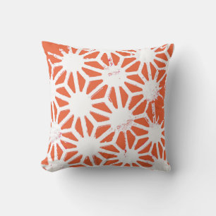 Orange and white geometric pattern cushion