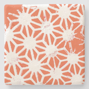 Orange and white geometric pattern stone coaster