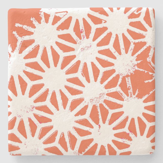 Orange and white geometric pattern stone coaster (Front)
