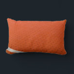 Orange and white textile lumbar cushion<br><div class="desc">Orange and white textile</div>