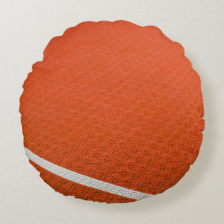 Orange and white textile round cushion