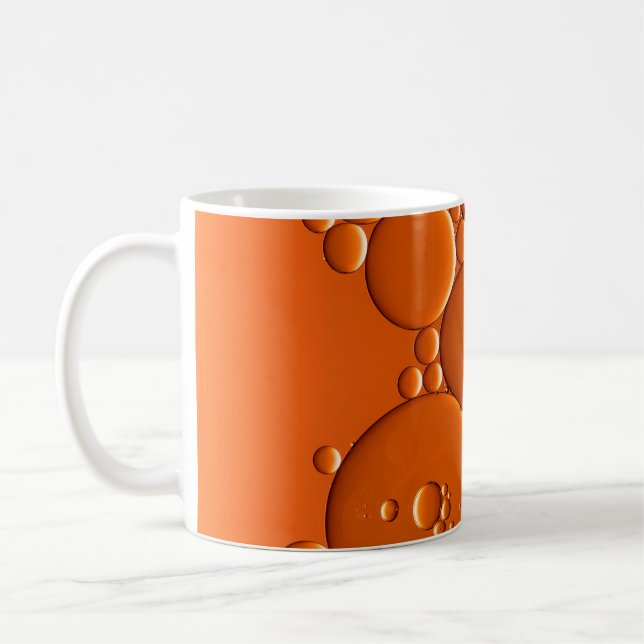 Orange bubbles art coffee mug (Left)