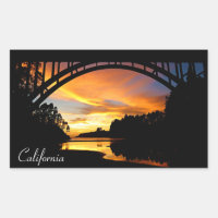 Orange California Coastal Sunset Under Bridge