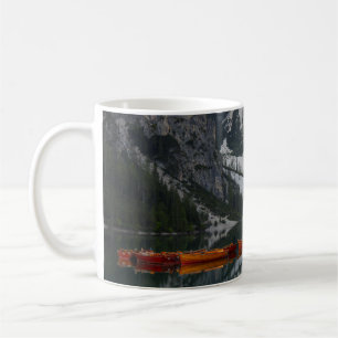 ORANGE CANOE ON BODY OF WATER COFFEE MUG