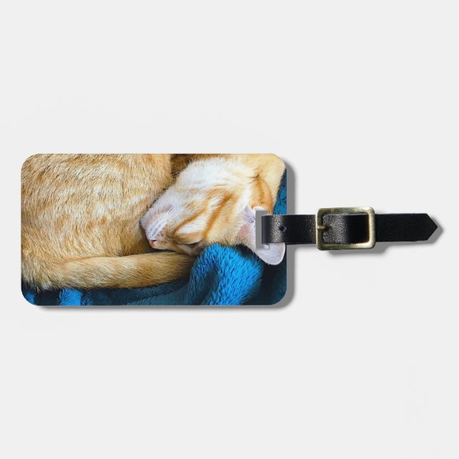 Orange cat curled up on blanket luggage tag (Front Horizontal)