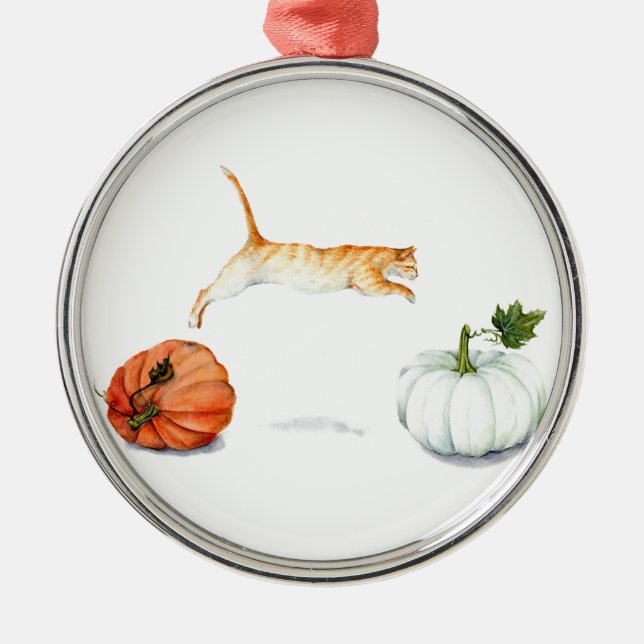 Orange Cat Jumping Between Pumpkins Metal Ornament (Front)