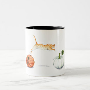 Orange Cat Jumping Between Pumpkins Two-Tone Coffee Mug