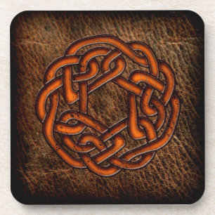 Orange celtic knot on leather coaster