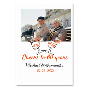 Orange cheers to 60 years anniversary wedding table number
