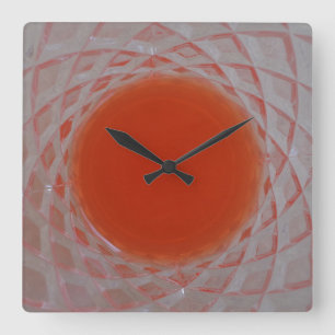 Orange circle inside crystal glass square wall clock