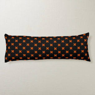 Orange cross stitches on black body cushion