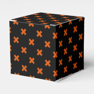 Orange cross stitches on black favour box