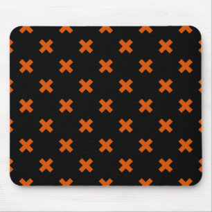 Orange cross stitches on black mouse pad