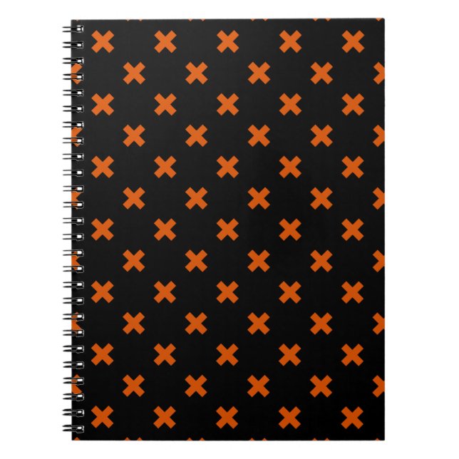 Orange cross stitches on black notebook (Front)