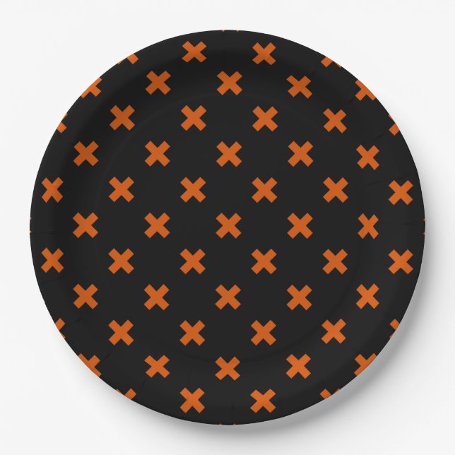 Orange cross stitches on black paper plate (Front)