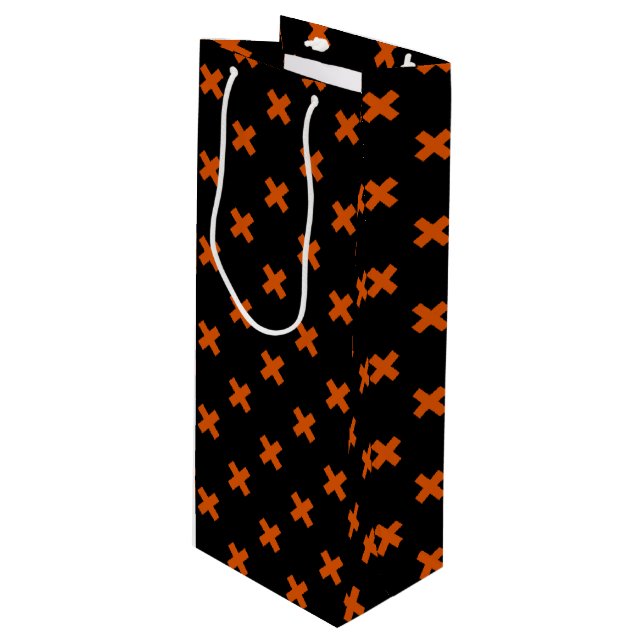 Orange cross stitches on black wine gift bag (Front Angled)
