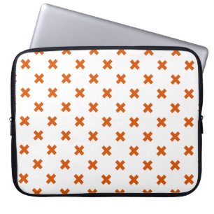 Orange cross stitches on white laptop sleeve