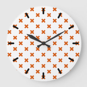 Orange cross stitches on white large clock