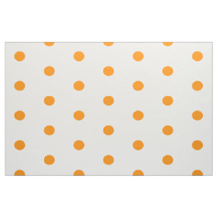 Orange dots on white fabric