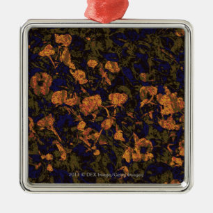Orange flower against leaf camouflage pattern metal ornament