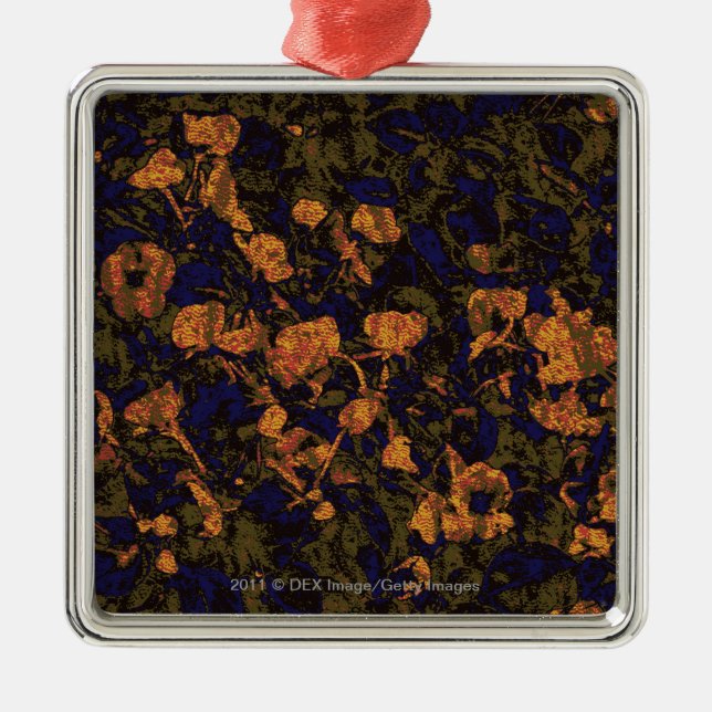 Orange flower against leaf camouflage pattern metal ornament (Front)