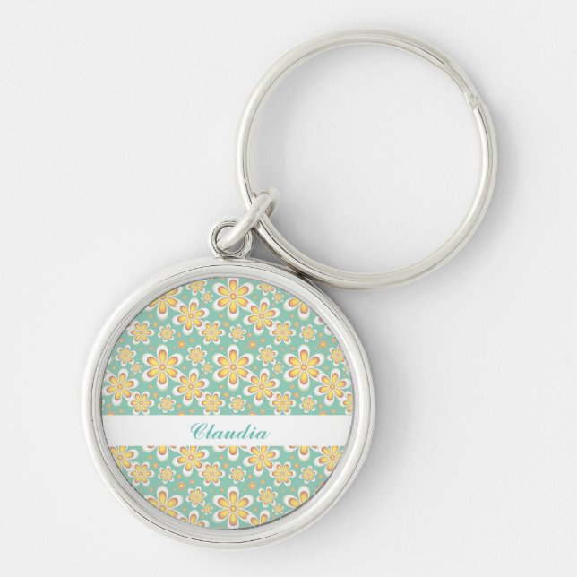 Orange flowers on green key ring (Front)