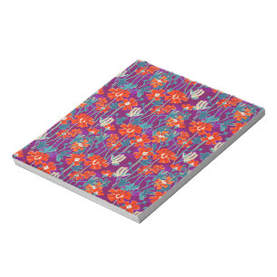 Orange flowers on purple throw pillow notepad
